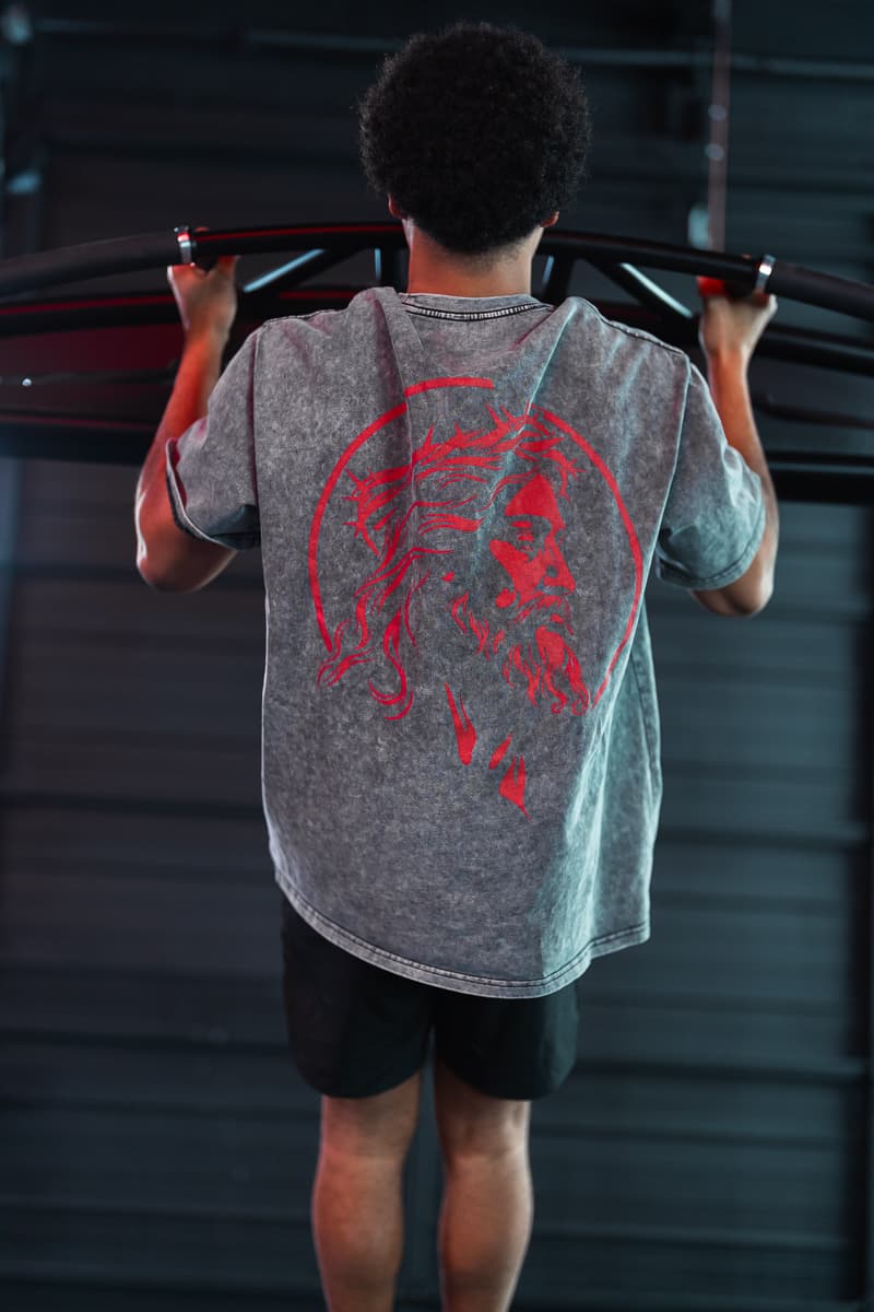 Athlete doing pull-ups in an Eternal Pump tee
